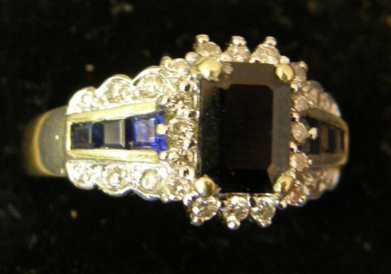 Appraisal: Sapphire and diamond cluster ring on a yellow metal shank