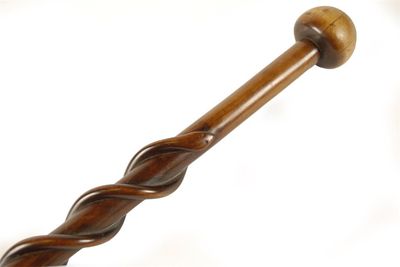 Appraisal: A Zulu mace the stem carved with two snakes in