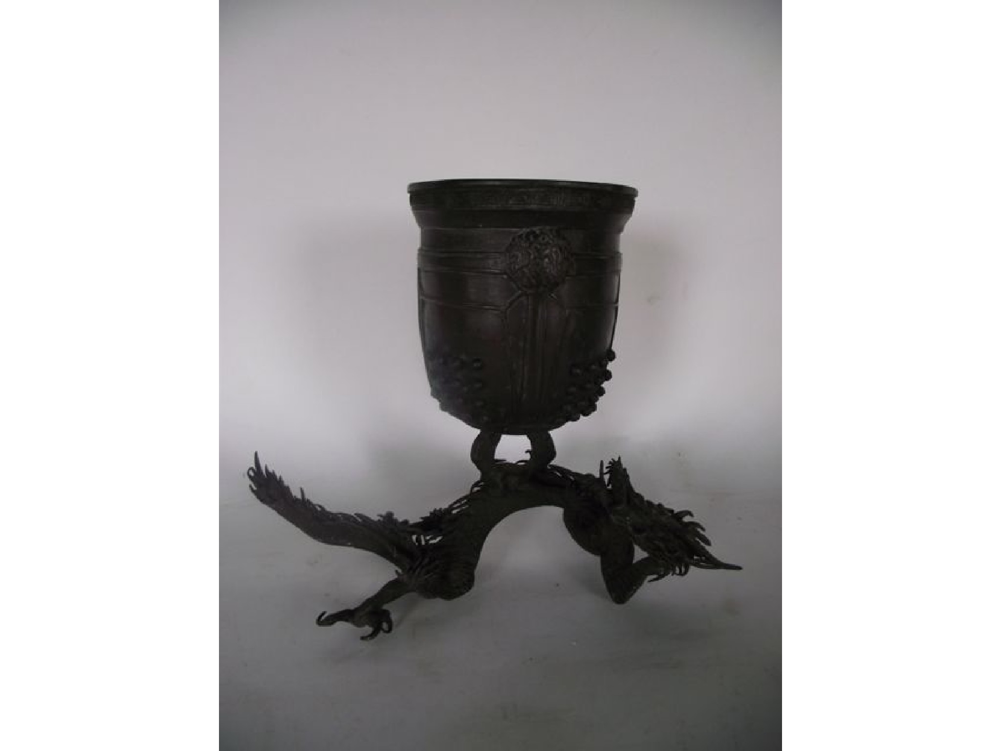 Appraisal: A Chinese cast metal vessel the bucket shaped bowl with