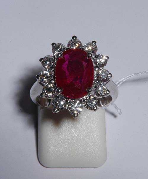 Appraisal: RUBY AND BRILLIANT-CUT DIAMOND RING White gold Elegant classic ring