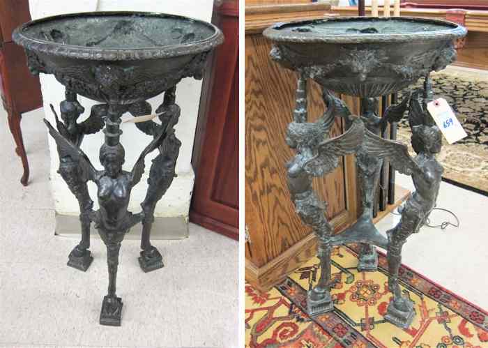 Appraisal: A PAIR OF BRONZE TRIPOD JARDINIERE STANDS each featuring a