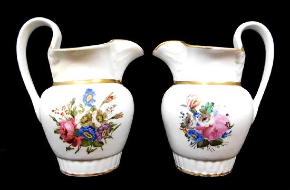 Appraisal: Two Tucker pitchers Philadelphia c each with pulled spouts fluted