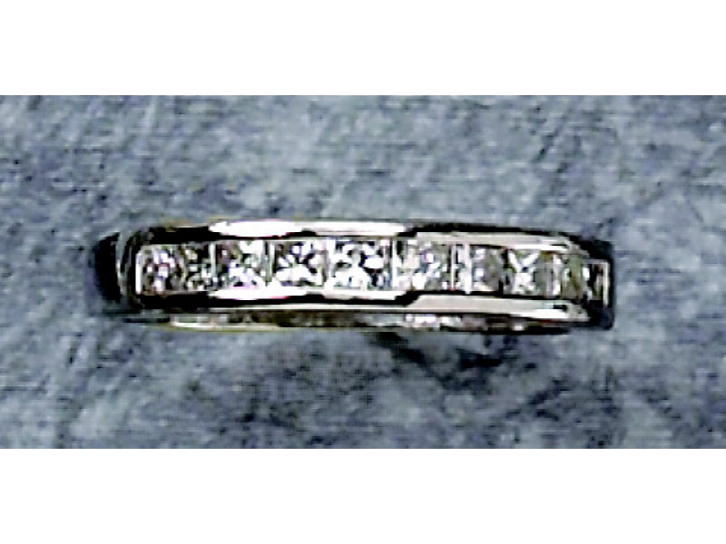 Appraisal: DIAMOND WEDDING RING Platinum channel set ring with ten princess