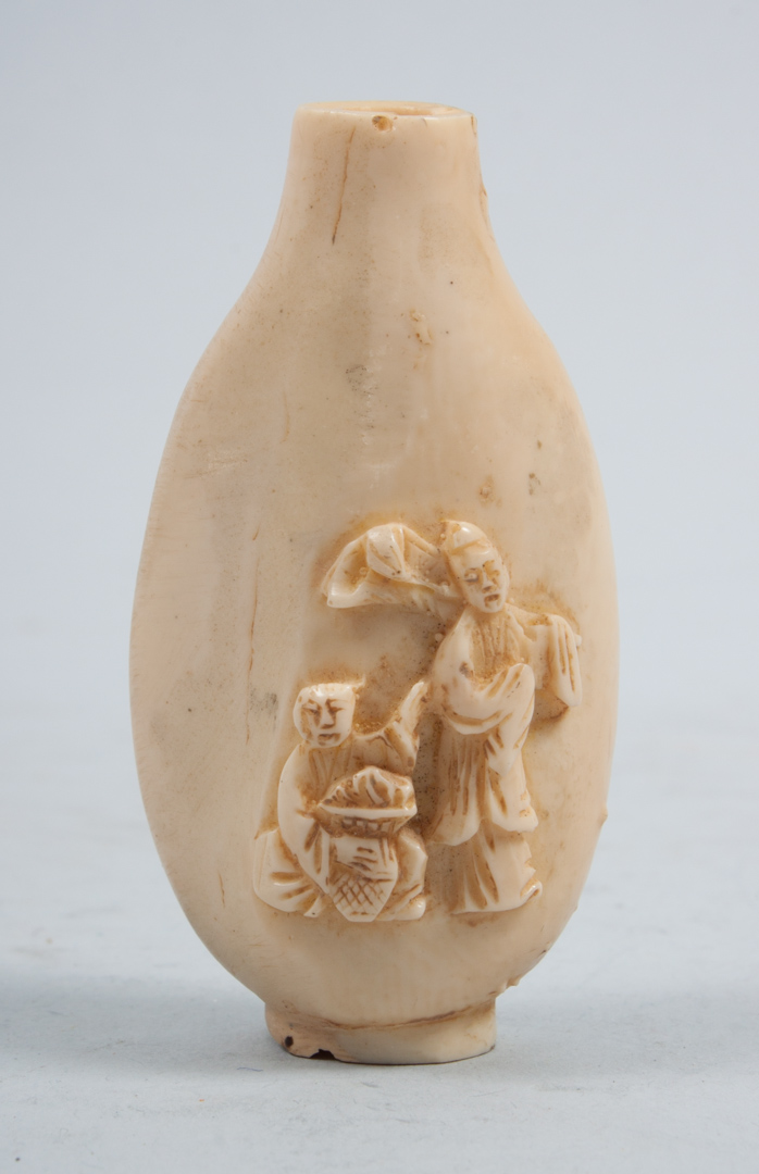 Appraisal: Chinese carved ivory snuff bottle with figural relief decoration on