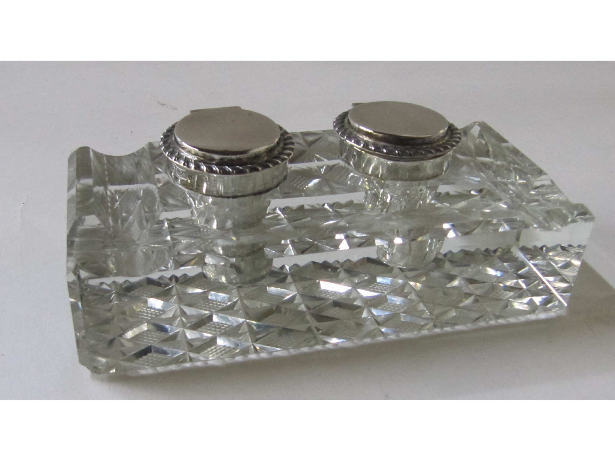 Appraisal: A cut glass double inkstand with silver tops Birmingham