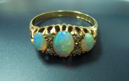 Appraisal: An early th Century opal and diamond ring set in