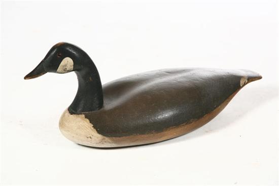 Appraisal: CARVED CANADA GOOSE American th century hardwood Lifesize goose with