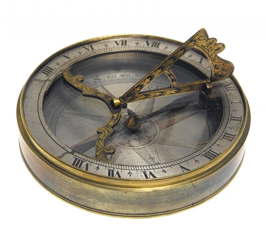 Appraisal: A SILVERED AND GILT BRASS POCKET SUNDIAL the unsigned hour