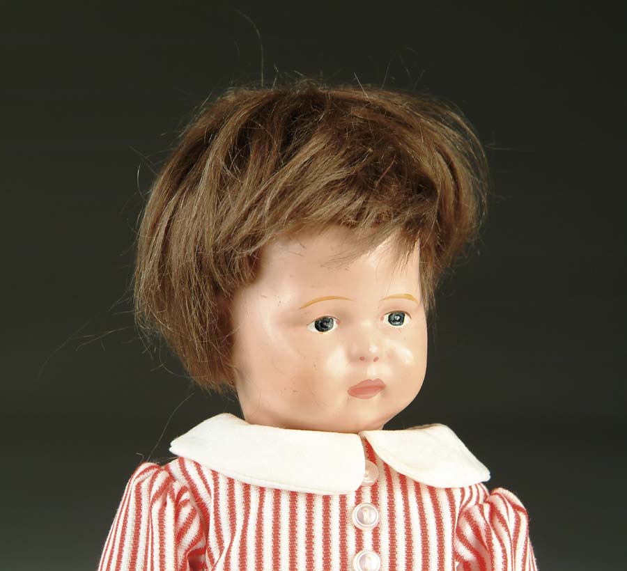 Appraisal: SCHOENHUT TODDLER DOLL All wooden doll fully articulated and held