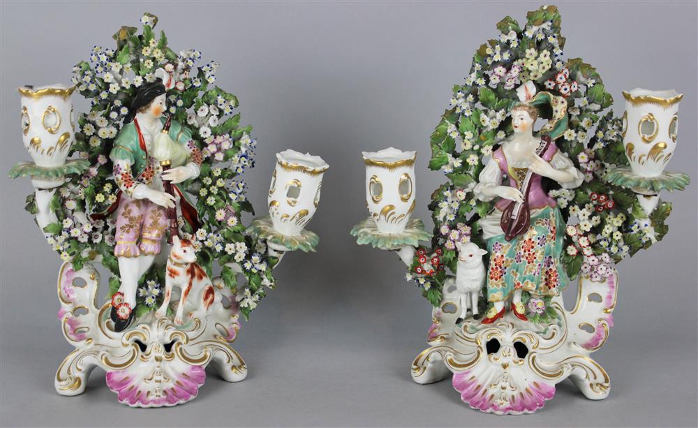 Appraisal: PAIR OF DERBY BOCAGE CANDELABRA ca modeled as a shepherd