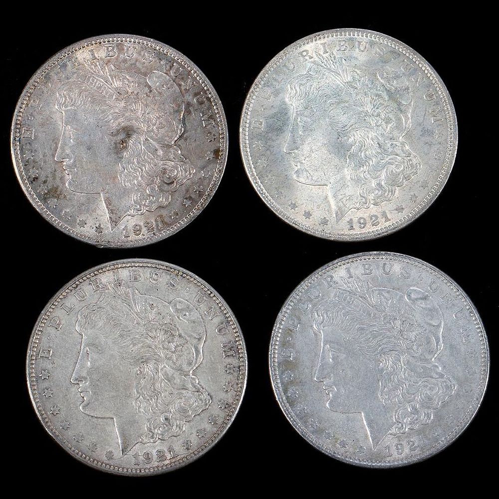 Appraisal: Four Morgan Silver Dollar Coins Four Morgan Silver Dollar Coins