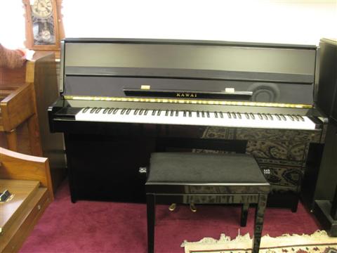 Appraisal: KAWAI CX- EBONIZED PIANO numbered with bench - Provenance Gordon