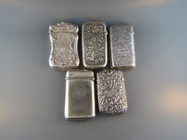 Appraisal: Match Safes German silver and silver soldered inculdes florals largest