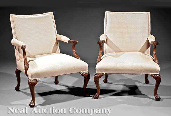 Appraisal: A Pair of Antique Georgian-Style Carved Walnut Library Chairs th