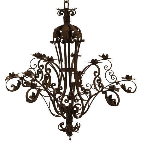 Appraisal: Spanish wrought iron and tole twelve-light chandelier in need of