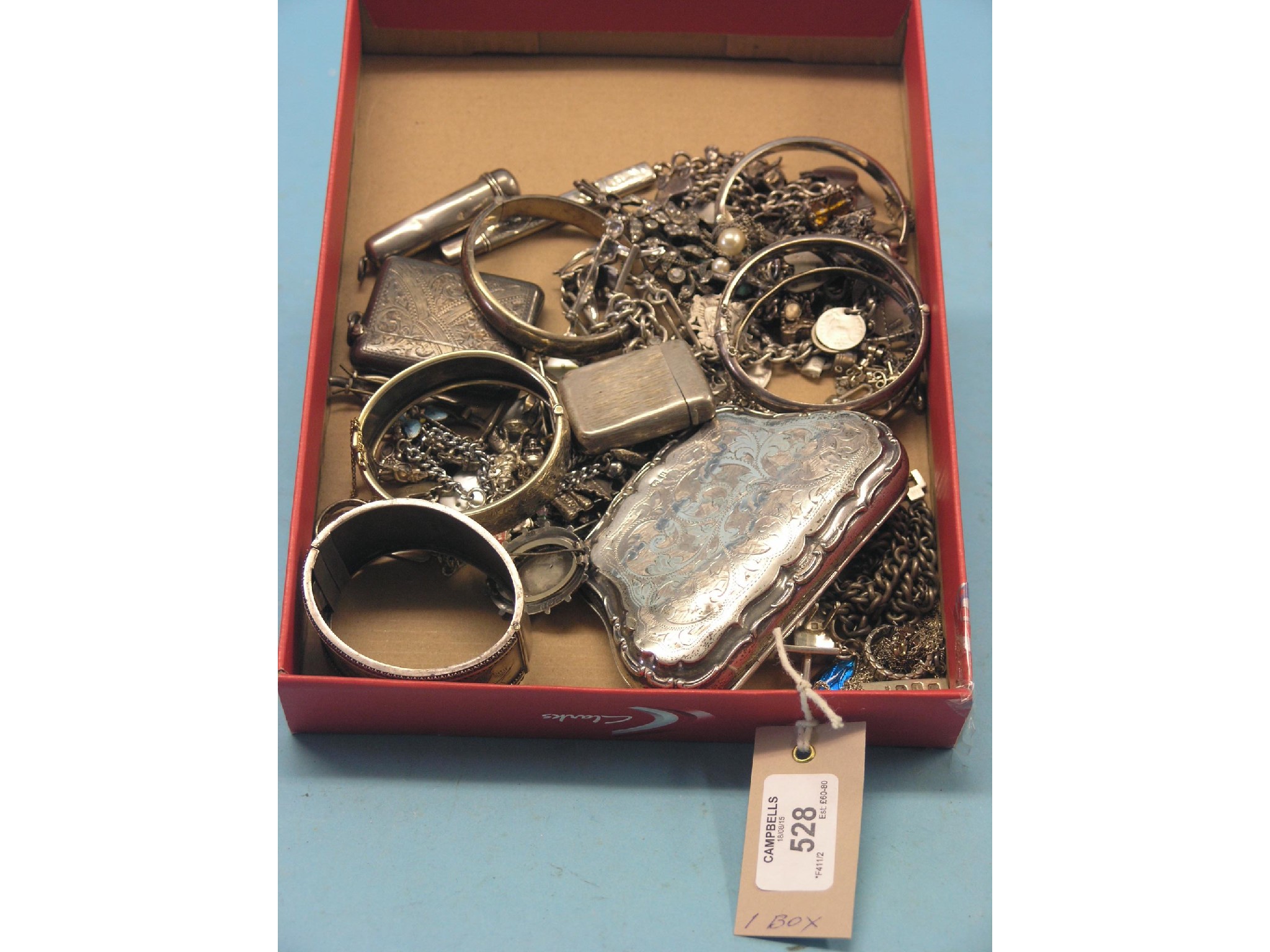 Appraisal: Silver and other jewellery including charm bracelets vesta case on