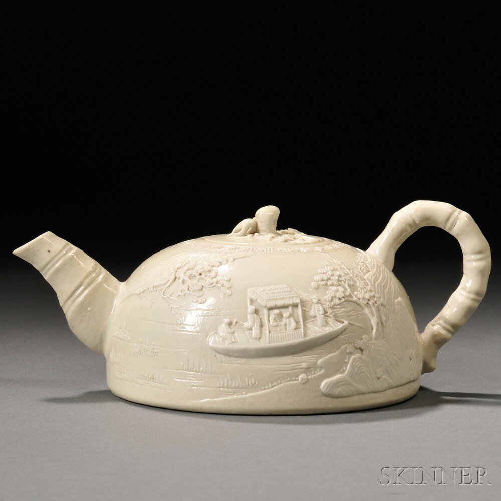 Appraisal: Lime Green-glazed Porcelain Teapot China th century decorated with carved