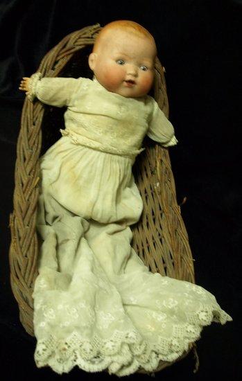 Appraisal: An Armand Marseille doll with weighted eyes and crying mechanism