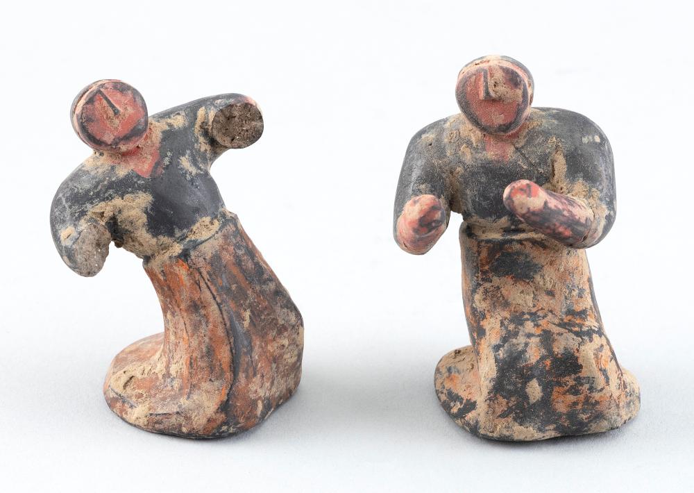 Appraisal: CASED SET OF TWO CHINESE POTTERY MINIATURE TOMB FIGURES HAN