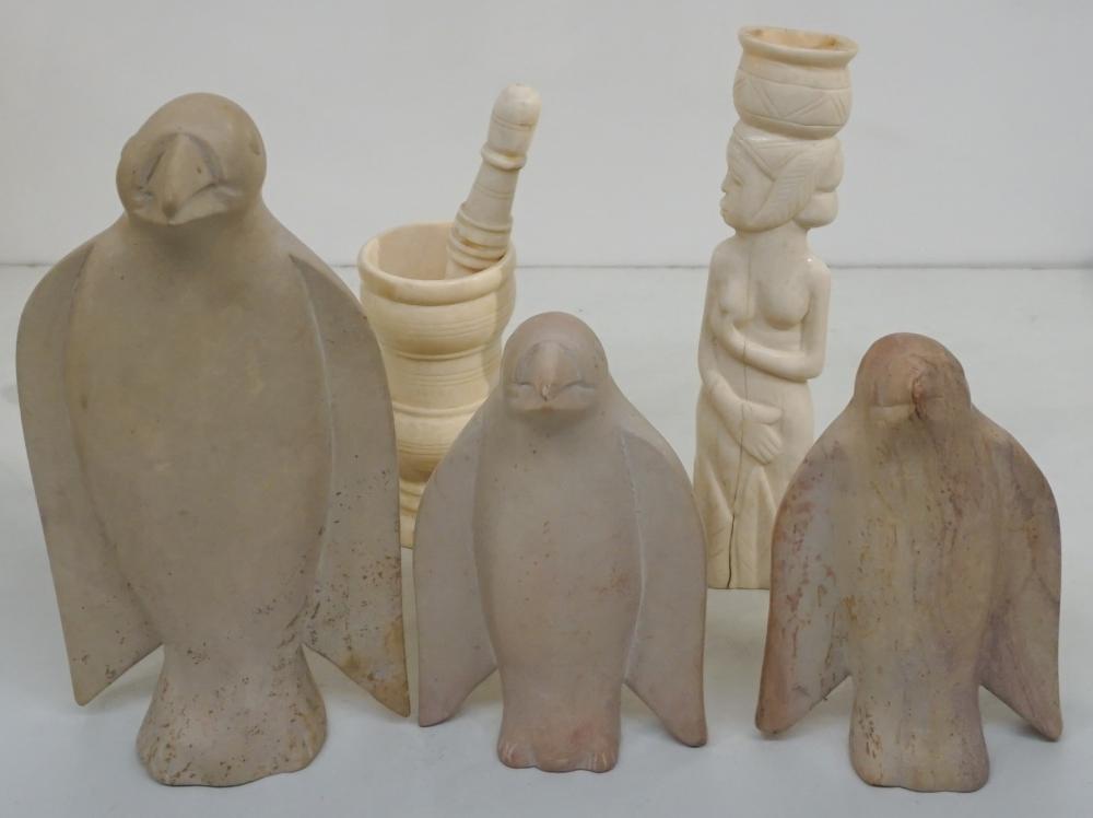 Appraisal: THREE CARVED STONE PENGUINS AFRICAN CARVED BONE FIGURE OF A