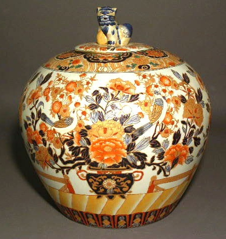 Appraisal: Chinese porcelain jar with Foo dog finial h x diam