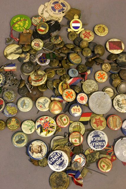 Appraisal: A collection of political and war related pins and badges