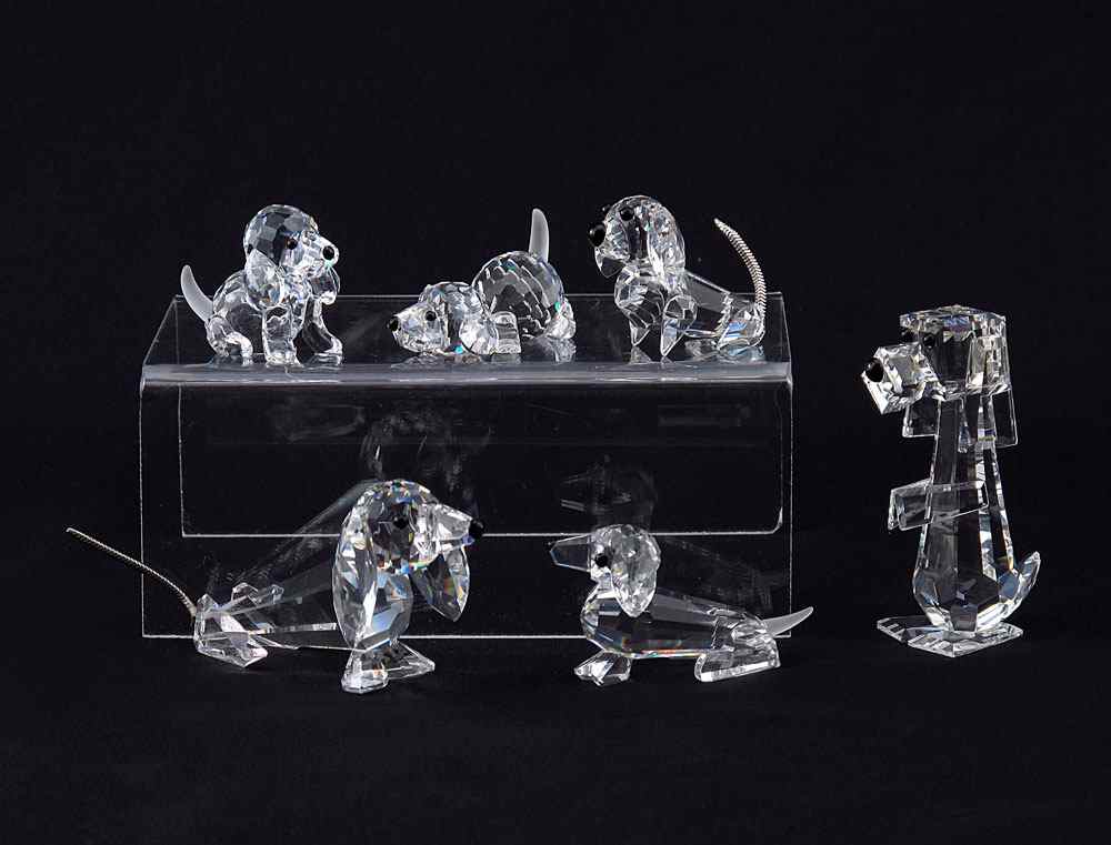 Appraisal: SWAROVSKI CRYSTAL DOG FIGURINES To include BEAGLE PUPPY Adi Stocker