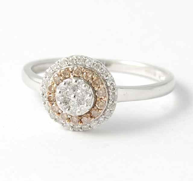 Appraisal: WHITE DIAMONDS YELLOW DIAMONDS AND FOURTEEN KARAT WHITE GOLD RING