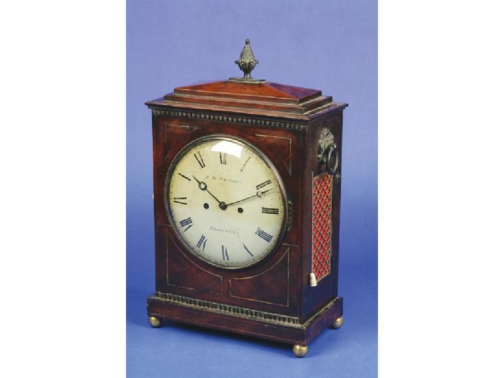 Appraisal: A REGENCY MAHOGANY AND BRASS STRUNG BRACKET CLOCK with a