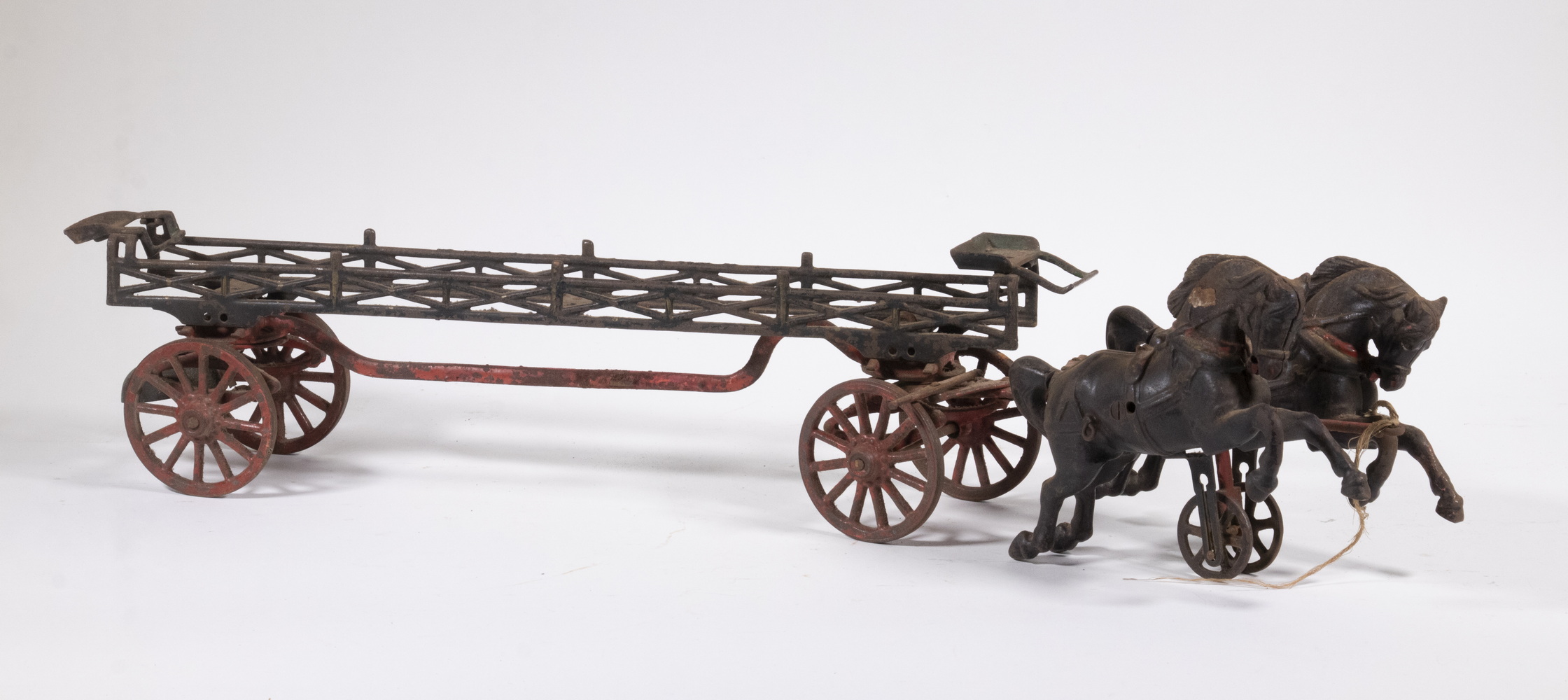 Appraisal: EARLY CAST IRON TOY HORSE DRAWN LADDER FIRE WAGON Unidentified