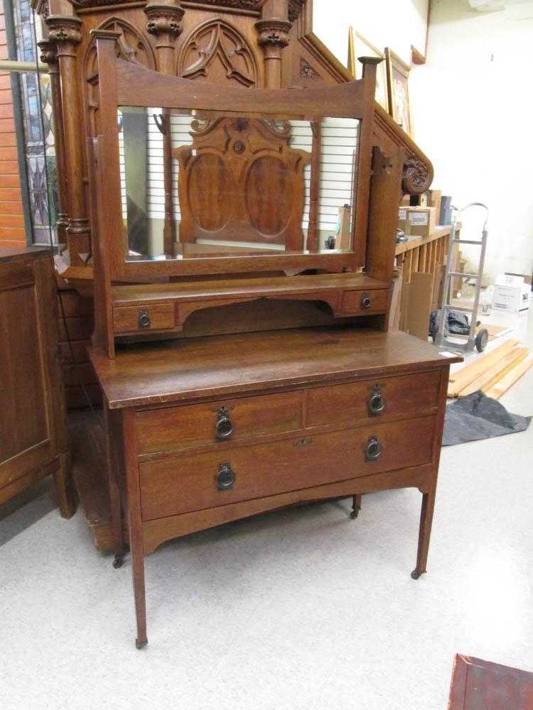 Appraisal: ARTS CRAFTS OAK DRESSER English early th century a three-drawer