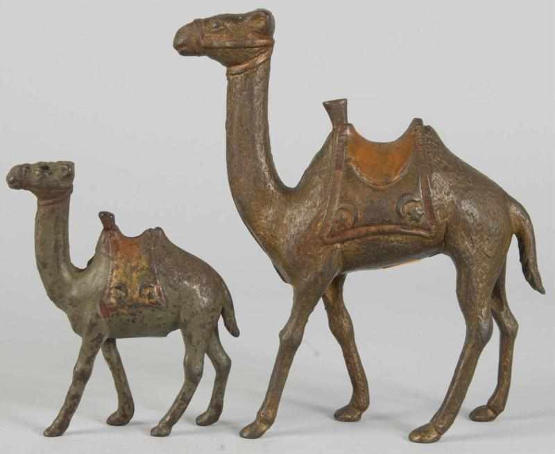 Appraisal: Lot of Cast Iron Camel Still Banks Description Includes larger