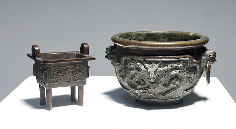 Appraisal: Two Chinese bronze planters Two Chinese bronze planters Round one