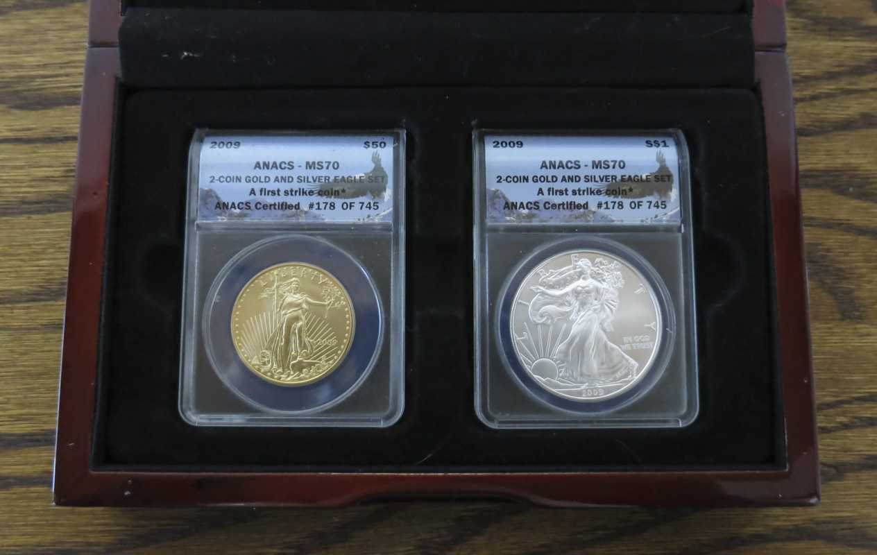 Appraisal: WOOD CASED AMERICAN GOLD AND SILVER EAGLE COIN SET dollar