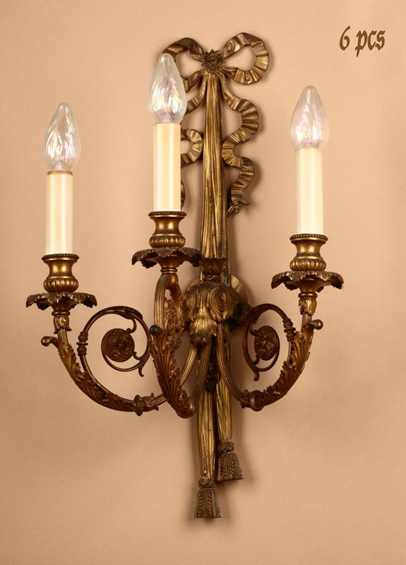 Appraisal: A set of six Louis XVI style gilt-bronze three-branch wall