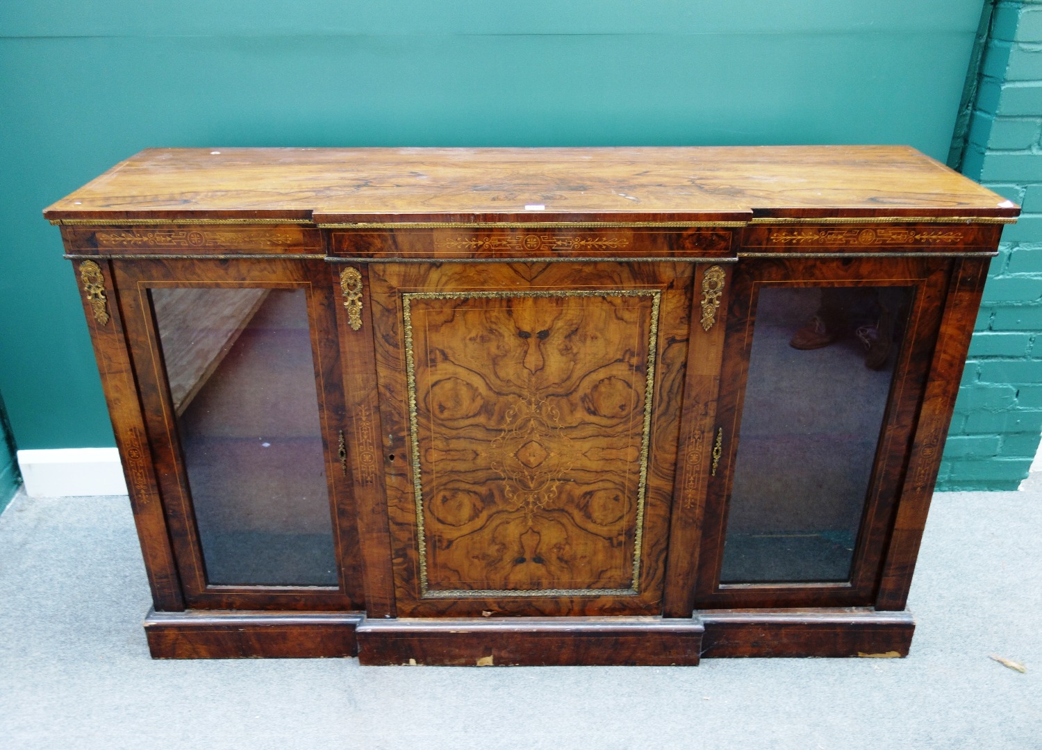 Appraisal: A Victorian gilt metal mounted marquetry inlaid figured walnut break