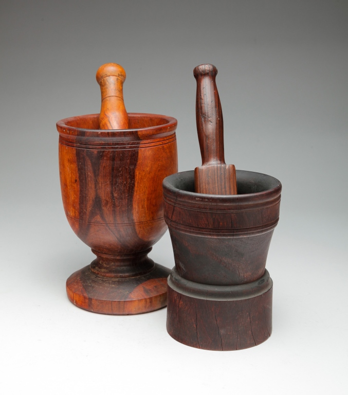 Appraisal: Late th century lignum vitae Larger with footed base age