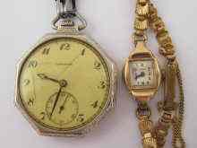 Appraisal: A white metal tests ct gold open face pocket watch