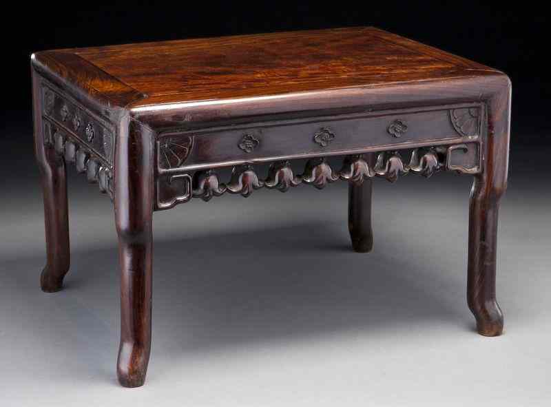 Appraisal: Chinese Qing rosewood low tablecarved to depict plum blossoms ''H