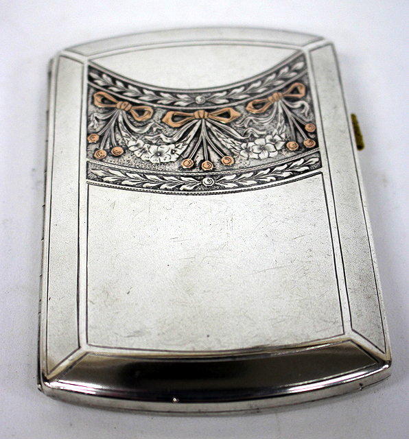 Appraisal: A CONTINENTAL SILVER CIGARETTE CASE with parcel gilt and engraved