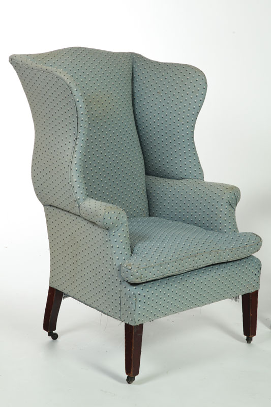 Appraisal: CHIPPENDALE WINGBACK CHAIR Twentieth century Tapered legs and blue upholstery