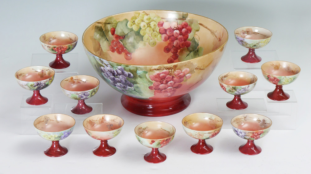 Appraisal: GUERIN LIMOGES HAND PAINTED PUNCH BOWL AND CUPS Hand painted