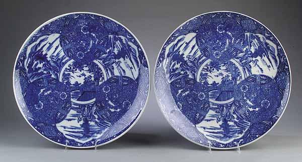 Appraisal: A Pair of Japanese Blue and White Chargers painted with