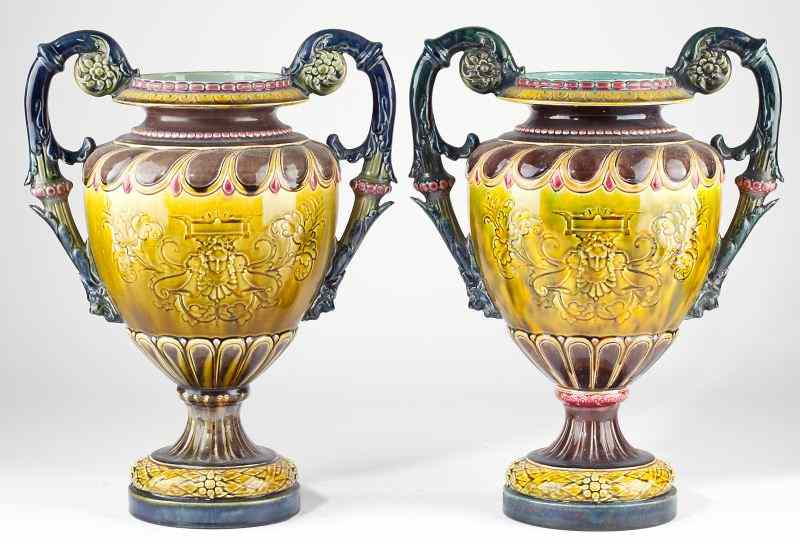 Appraisal: Pair of Sarreguemines Majolica Urnswarm mustard and brown tones with