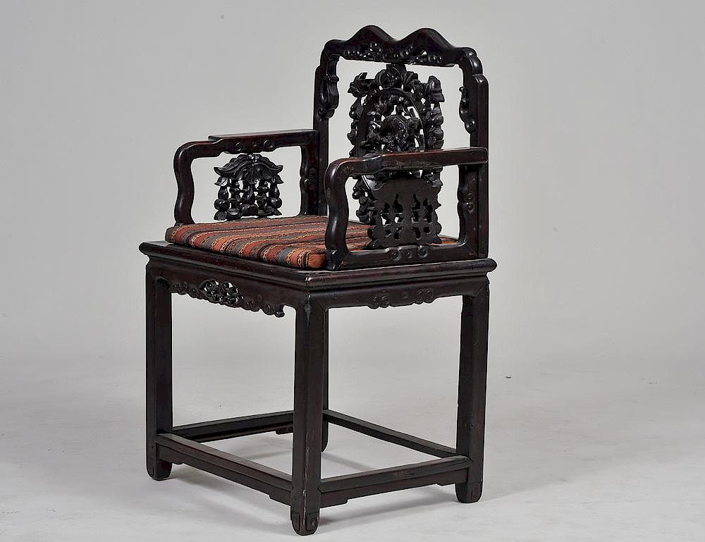 Appraisal: CARVED HARDWOOD ARMCHAIR Chinese With fu dog splat above the