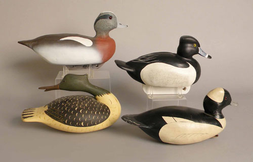 Appraisal: Group of four duck decoys th c including a merganser