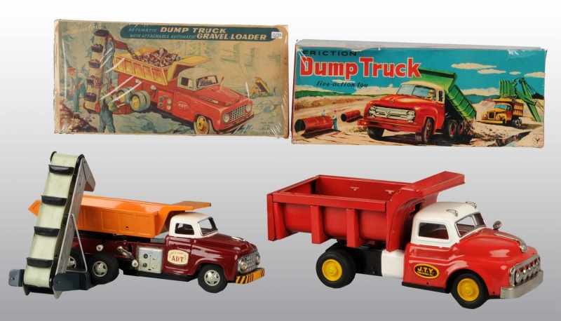 Appraisal: Lot of Tin Dump Truck Toys Description Japanese Working Includes