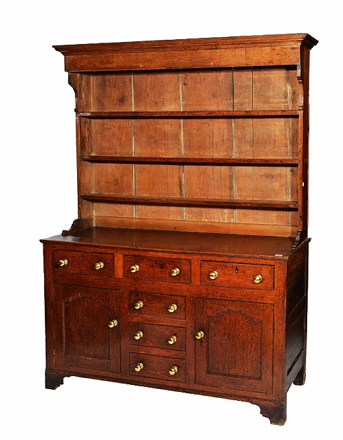 Appraisal: A GEORGE III OAK DRESSER IN TWO PARTS with rack