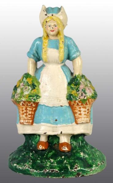 Appraisal: Cast Iron Dutch Girl Doorstop Description Made by Hubley cat