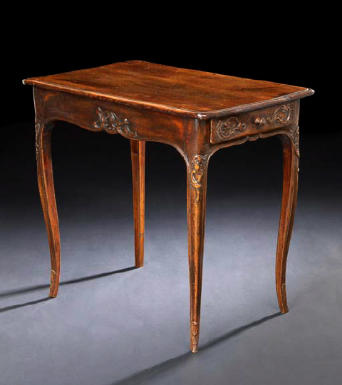 Appraisal: French Provincial Carved Fruitwood Occasional Table third quarter th century